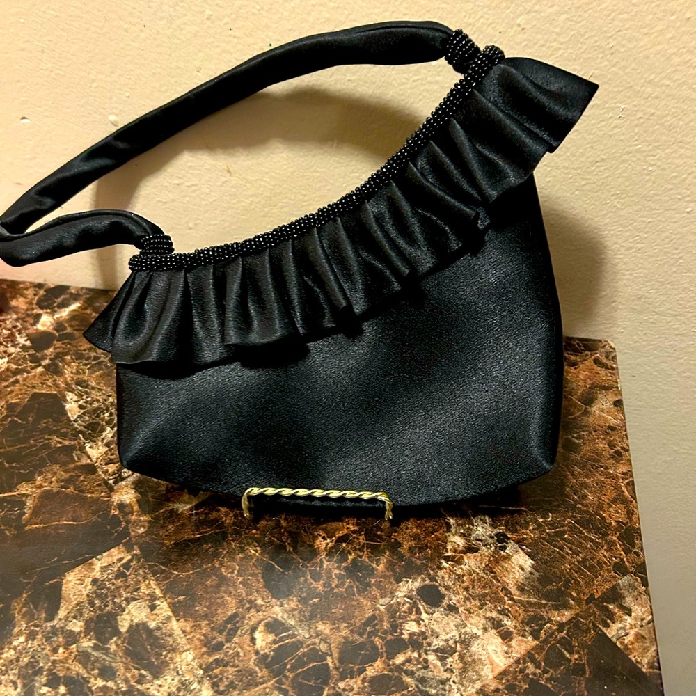 Black Ruffled shoulder bag with black accent beading